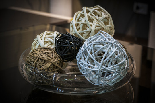 Wicker rattan balls for decoration of interiors. Photos with vignetting effect.