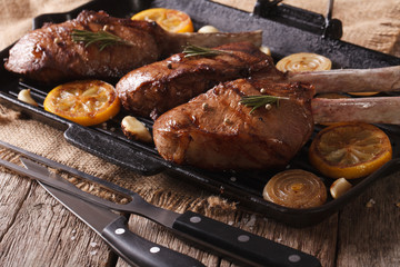 Beef steak with grilled vegetables on pan close-up. horizontal
