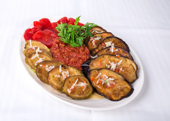 Delicious baked vegetables with tomato sauce.