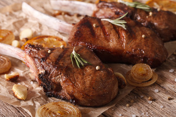 grilled beef steak with rosemary on a paper close-up. Horizontal
