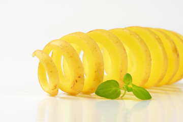 raw spiral cut potato