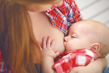 breastfeeding. mother breast feeding baby