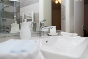 Sink, Tap, Towels and Bathroom Set. Modern Bathroom Interior Des