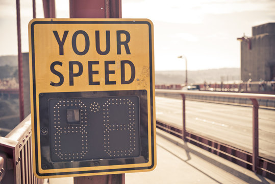 Your speed sign on the bridge in sepia style