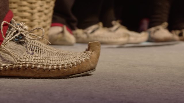 Male choir dressed in traditional footwear Peasants on celebration of St. Michael in Dalmatian town Oklaj in Promina area near Krka national park.