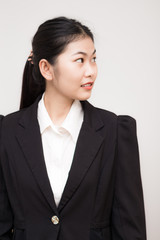 Smiling Asian Caucasian Business Woman.