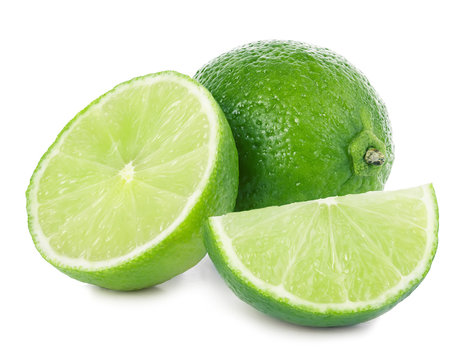 Lime. Whole lime with slices isolated on white background, with clipping path.