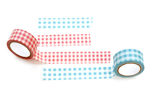 Collection of different stripes of masking tapes on white background for scrapbook