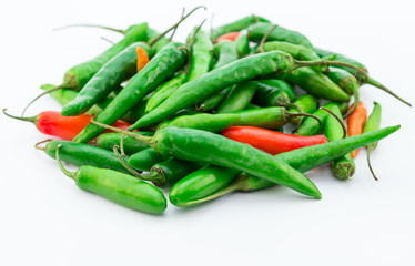 Green and red chilli peppers isolated on white background