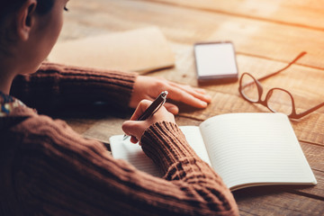 Making notes. 