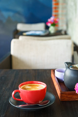 Coffee red cup in coffee shop