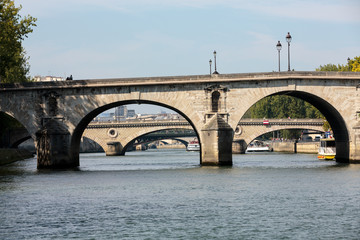 The Pont Neuf is the oldest standing bridge across the river Seine in Paris, France.