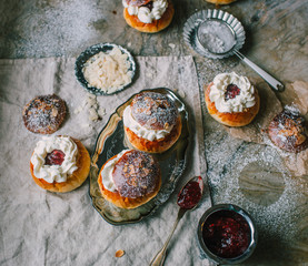 Homemade buns with jam and cream