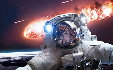 The Falling Meteor Rain. Comet in space, meteor and energy, asteroid glow, powerful star moving. Elements of this image furnished by NASA © Vadimsadovski