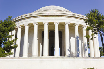 Fototapeta premium View of the circular colonnade & domed roof of the Thomas Jefferson Memorial designed by John Rusell Pope in the Classical Revival style, West Potomac Park, National Mall, Washington DC