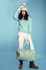 Naklejka premium fashion studio photo of beautiful sexy girl with dark hair wears warm cozy winter clothes 