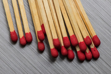 Loose Matches on brushed metal background