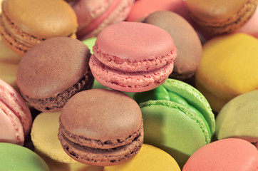 Colourful tasty macaroons as backgrund