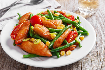 chicken with green beans and tomato corn