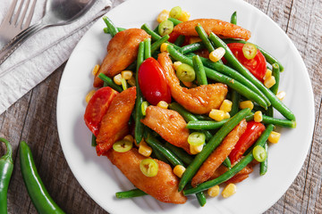 chicken with green beans and tomato corn