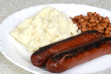 closeup sausages with mashed potatoes