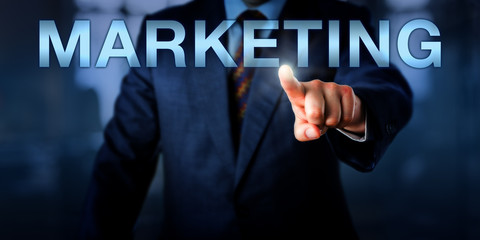 Marketeer Pointing At MARKETING Onscreen