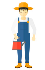 Farmer with watering can.