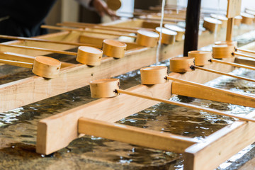 Bamboo Japanese purification ladle at entrance of Japanese Temple