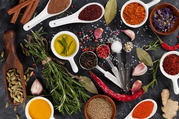 Tuinposter Herbs, condiments and spices © karandaev