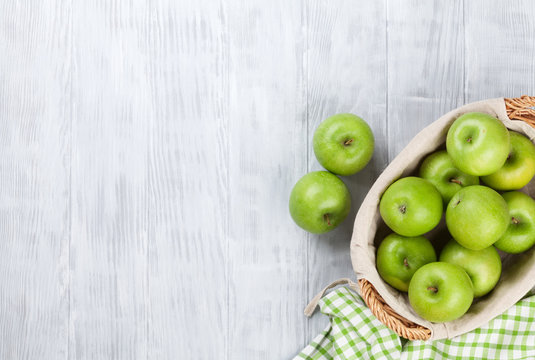Green apples in basket