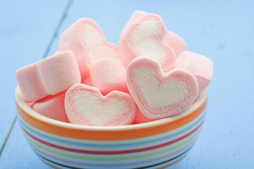 Fototapeta na wymiar Pink heart shape of marshmallow with filter effect retro vintage