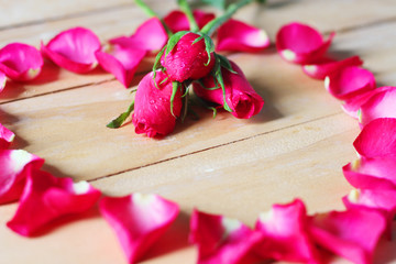 Petals of roses on the table.