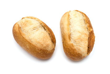 two freshly baked bread rolls on white background