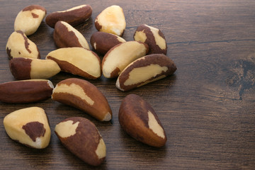 brasil nuts on wooden background