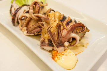 Squid grill on white dish