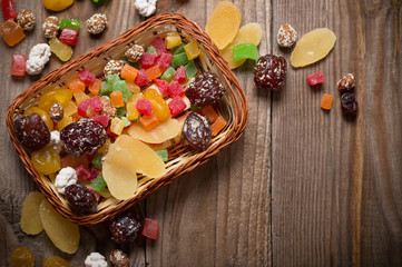 dried fruits mix on wooden background