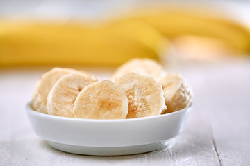 Fresh banana slices in bowl