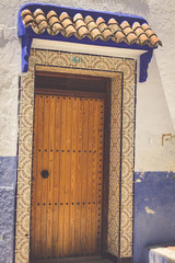 Traditional moroccan door detail in Chefchaouen, Morocco, Africa