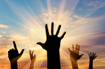 Silhouette of hands of people