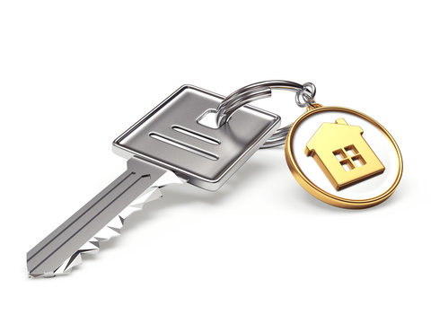 Silver key and round keychain with house isolated on white
