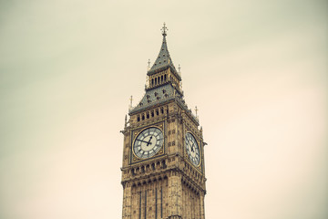 detailed close-up of Elizabeth Tower (Big Ben Clocktower) in front of gray cloudy sky, vintage filtered style, London, United Kingdom, Europe © AR Pictures