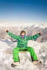 Fototapeta na wymiar Sport man in snowy mountains