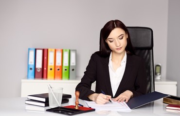 Woman notary public notarizes the document