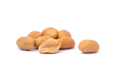 Roasted salted peanuts isolated on a white background