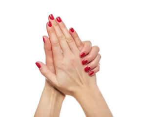 Poster Women's hands with red nail polish. © Tanya Rozhnovskaya