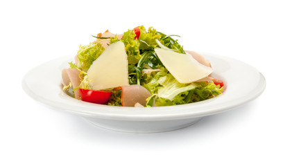 Vegetable salad with ham, parmesan cheese and cherry tomatoes.