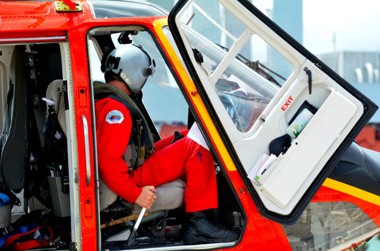 Rescue Helicopter pilot sit in the cockpit