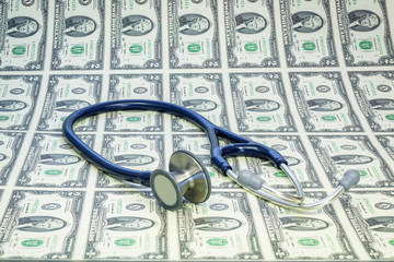 Money backdrop and a Stethoscope