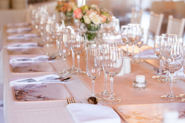 Champaigne and wine glasses on table at wedding reception