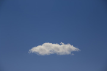 White fluffy cloud in the blue sky